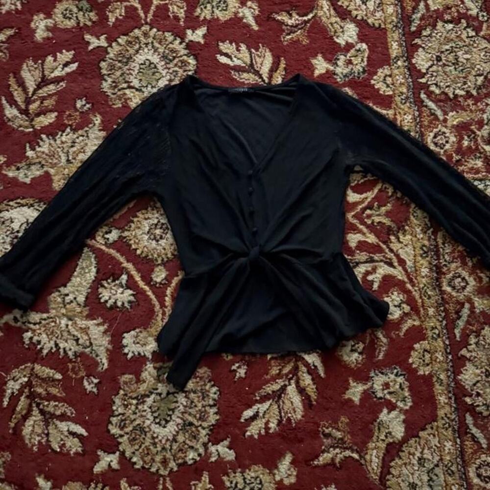 Black long sleeve top with